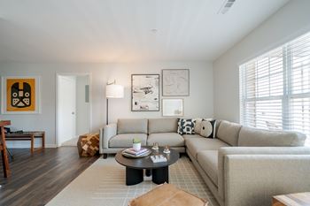 Spacious living room at the residences at stevens pond in saugus, ma 01906